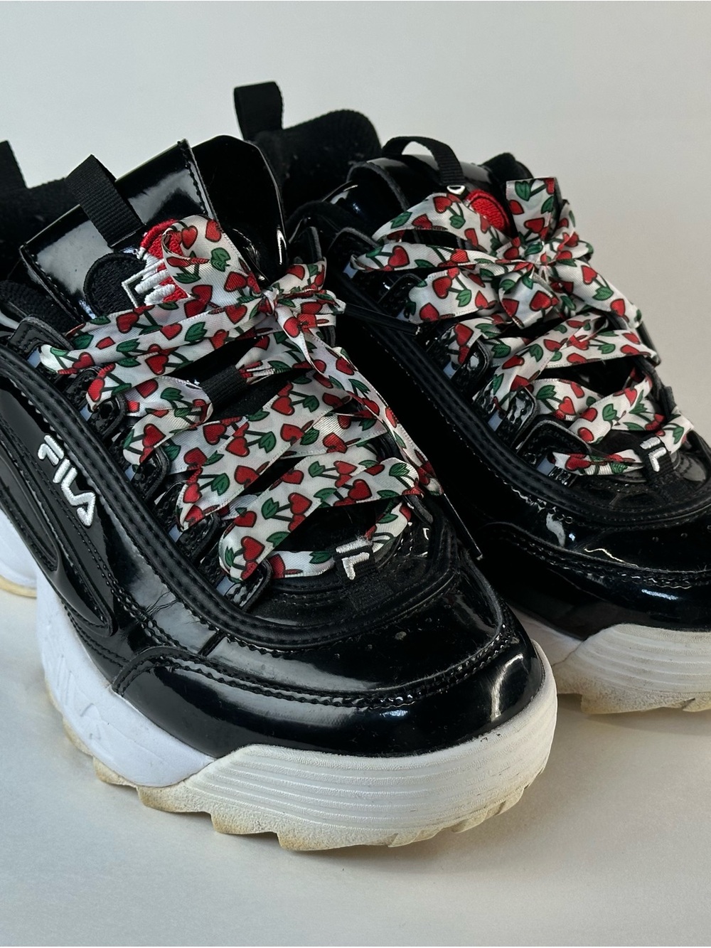 FILA Black Patent Chunky Sneakers with Cherry-Patterned Laces sz US 7